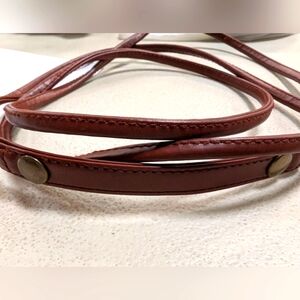 Brown Leather Strap with Brass Accents 31" Round